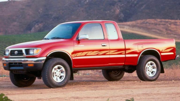 1995 Toyota Tacoma in red.